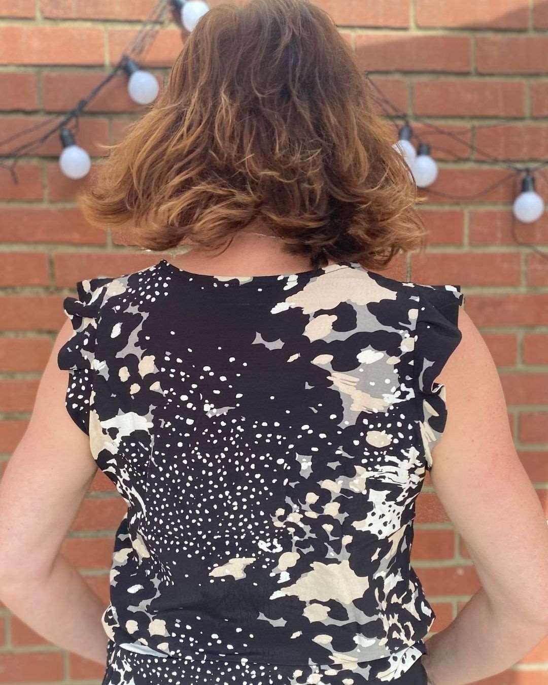 back view of kefi frill sleeve top affordable sustainable clothing