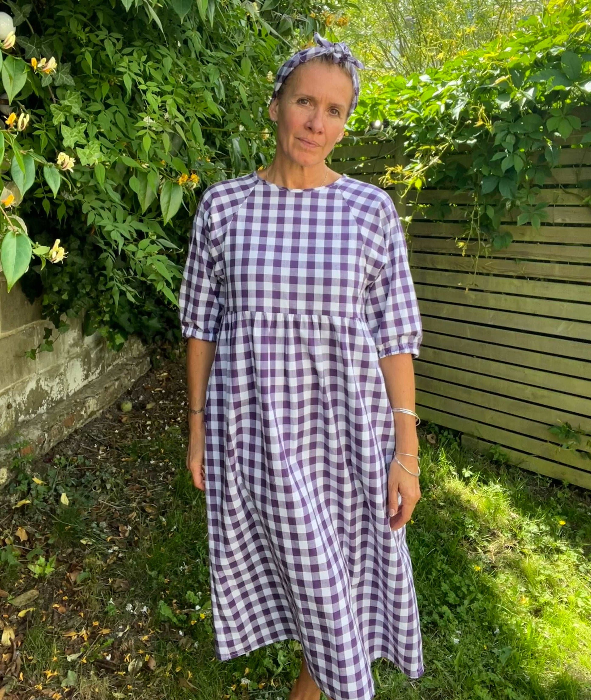 purple gingham kay dress front view and matching headband sustainable dresses UK