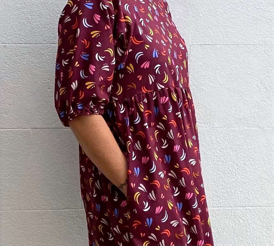 close up of Kay dress with pockets maroon first