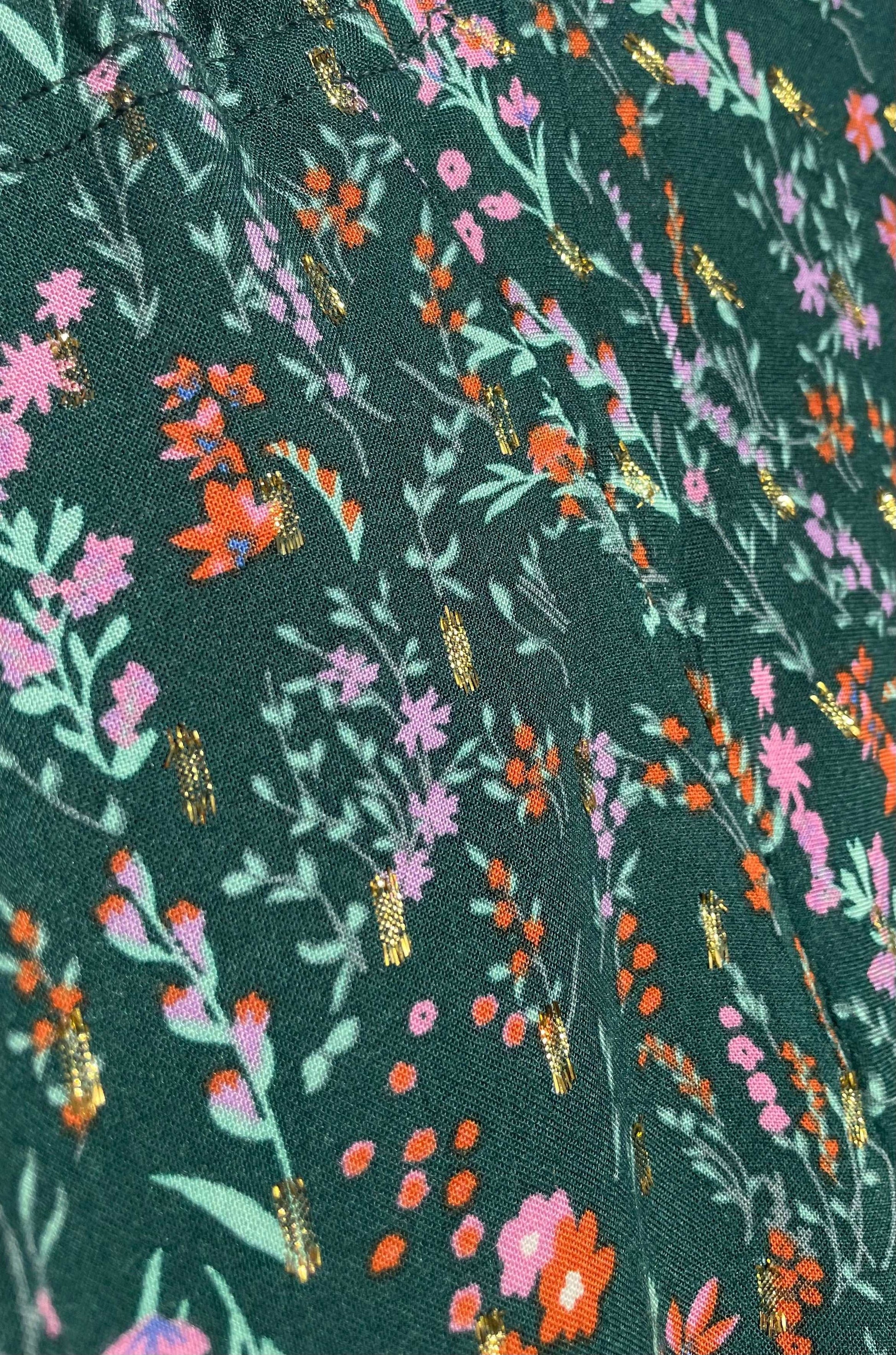Green ditsy floral fabric