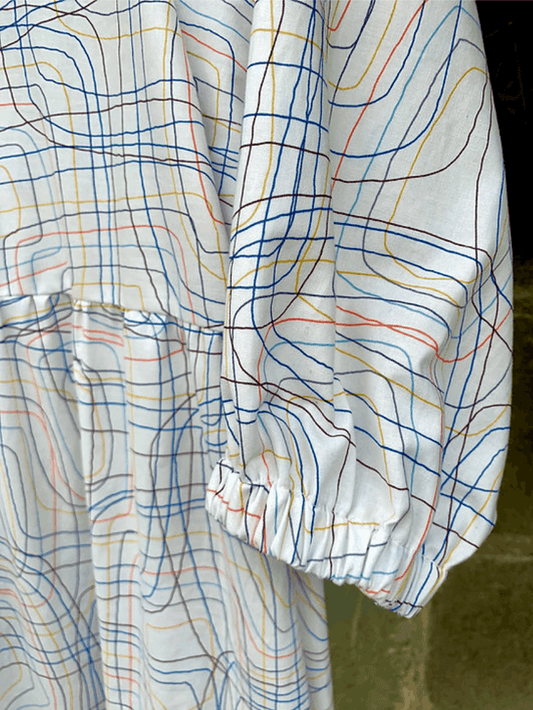 close up of the fabric in Kay Dress in Cream Ley Lines Cotton